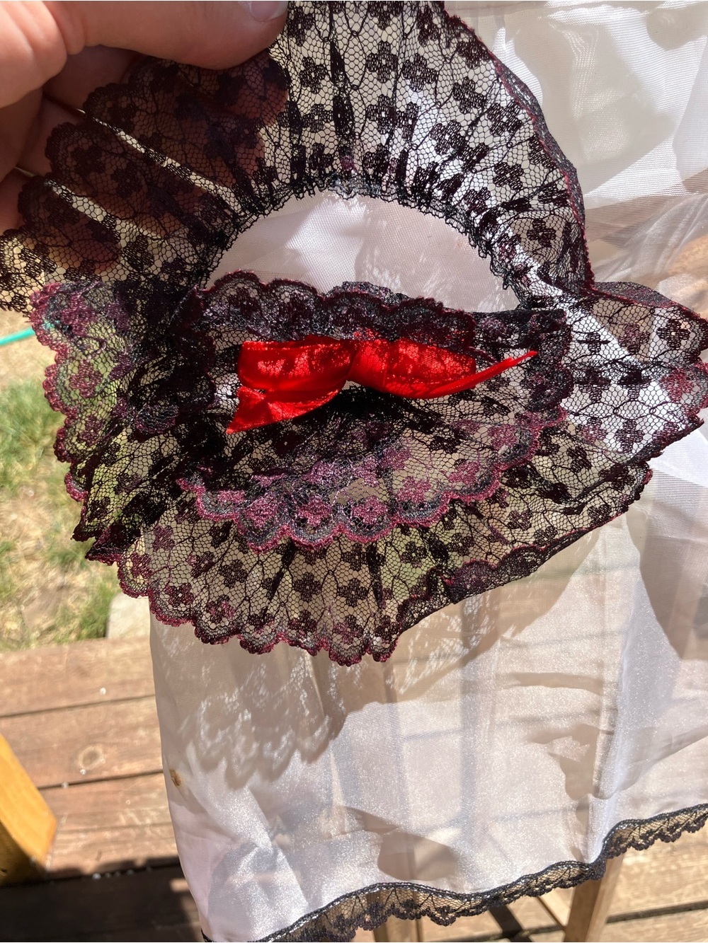 Vintage sheer apron with black and red lace pocket